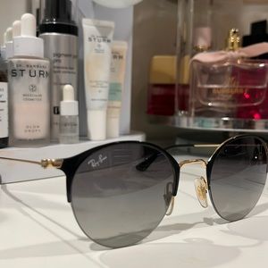 Black and gold raybans